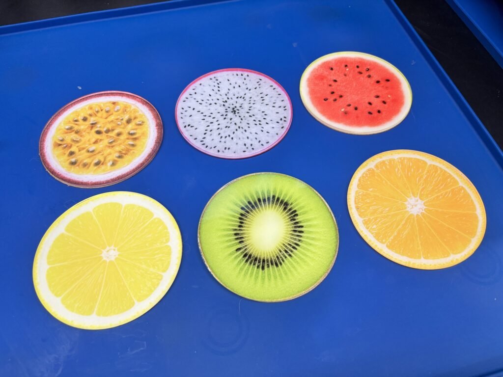 Six round acrylic coasters UV printed as fruit slices