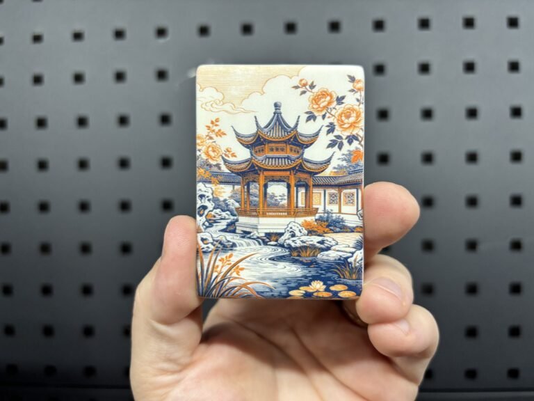 Rectangular fridge magnet UV printed with an orange and blue garden pavilion illustration